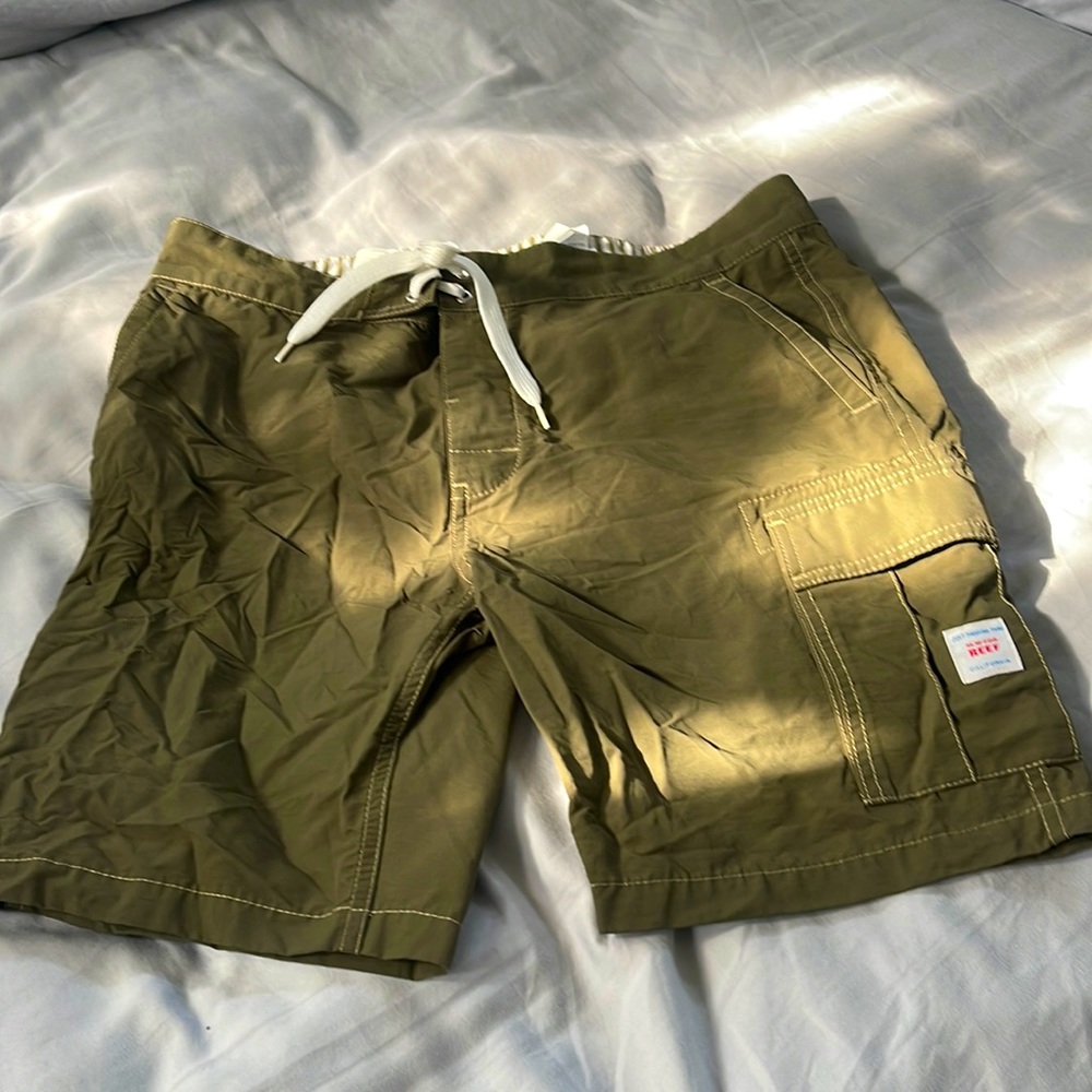 Olive-colored Reef board shorts